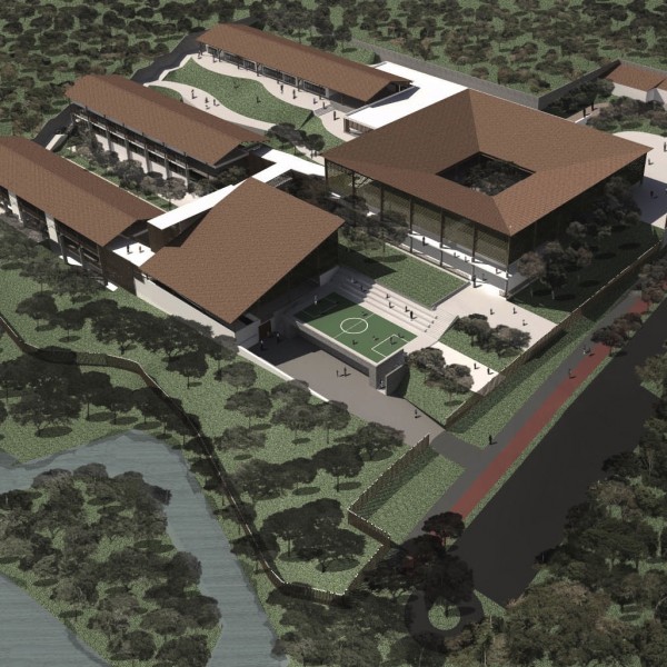 Escola de Educação Infantil e Fundamental: Vista geral da implantação dos edifícios tira partido do alto declive da topografia.