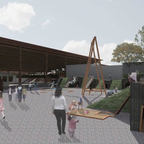 Escola de Educação Infantil e Fundamental: Praça de acesso a escola, ao fundo o fechamento parcial do edifício em bambu sobre toras de eucalipto que controla a entrada de insolação no pátio interno coberto.